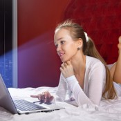 Young Girl Enjoying Malware Free Browsing on Her Laptop